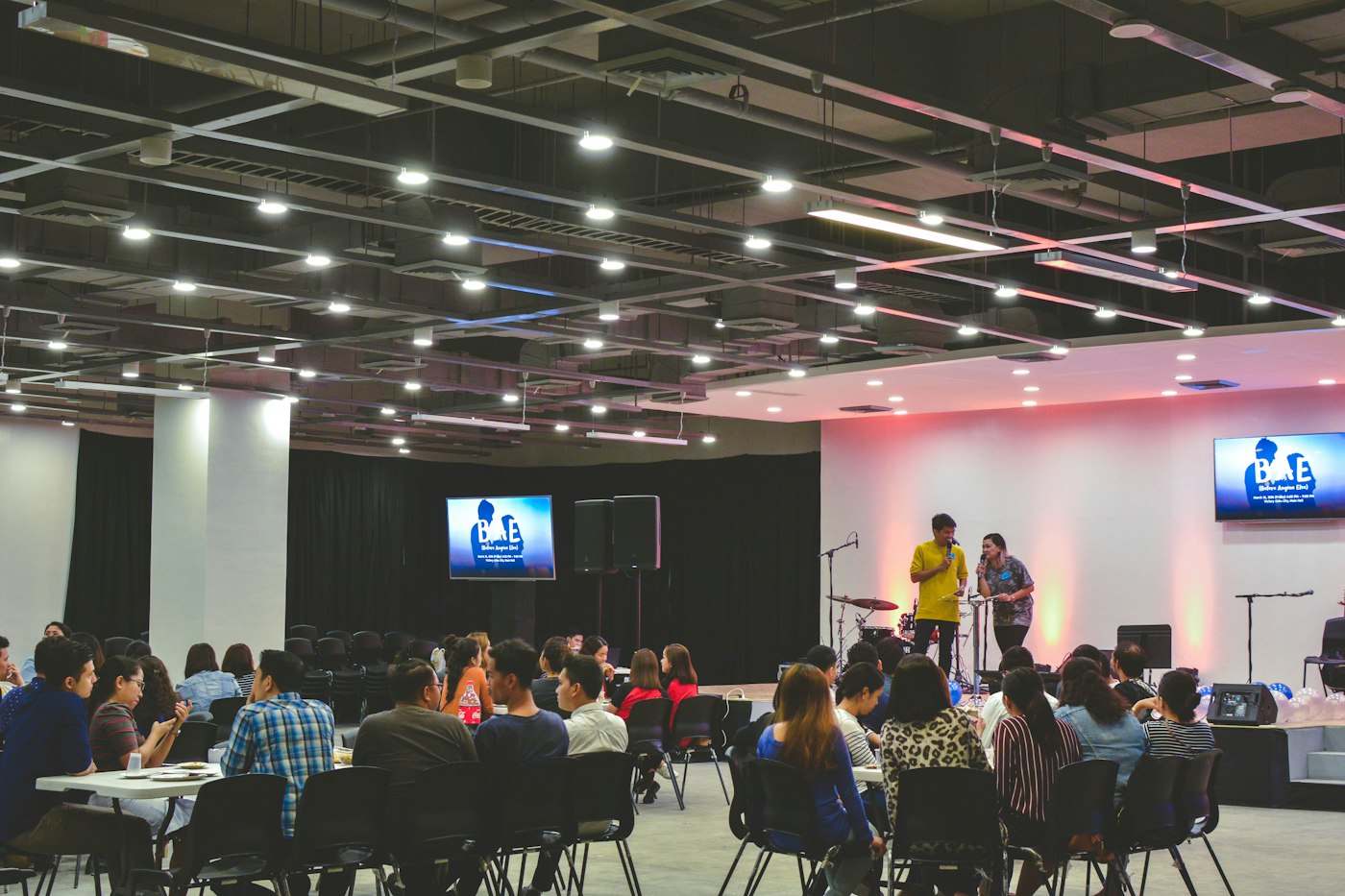 Students attending a presentation in a campus lecture hall